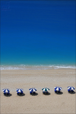 mistymorningme:  Egremnoi © imagea.org Egremnoi beach - Lefkada island - Ionian islands - Greece  my friends, i have reserved us spots on the beach. comfortable chairs, plenty of sun, sand, and relaxation. room service is on call to make sure we have