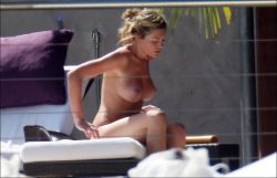 toplessbeachcelebs:  Abigail Clancy (British Model) sunbathing topless in St. Bart's (June 2008) 