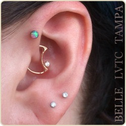 lasvegastattooco:  Dreamy daith moon by Body Gems in 14k yellow gold with a pretty little swarovski crystal. We love the way it complements her existing Neometal pieces in her lobe and forward. Thanks for looking! (Las Vegas Tattoo Co.-Tampa-Ybor City-FL)