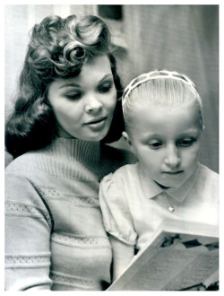 CANDY WANTS A NEW LIFE Vintage press photo dated from February of &lsquo;63, features Candy Barr reading to her 7 year-old daughter: &ldquo;Troylene&rdquo;; after being released from Huntsville prison.. Ms. Barr served 3 Years   91 Days of an insane 15-ye