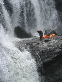 thecrimsonarcher:  Another random photo for the evening— Here, one of the kayakers is prepping himself for the plunge of a lifetime. He was looking down the second tier of the falls to presumably see where he should launch his kayak. This photo that