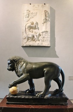 hadrian6:   The Albani lion. 1st-century Roman green basalt lion statue with a yellow marble sphere under one paw, in the Albani Collection in the Denon Wing of the Louvre. Paris.    http://hadrian6.tumblr.com 