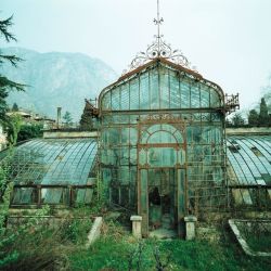 steampunktendencies:  First Pic : Abandoned Victorian Style Greenhouse, Villa Maria, in northern Italy near Lake Como. Photo taken in 1985 by Friedhelm Thomas.  Update : The greenhouse has since been restored.  Credits and Sources found by Steampunk