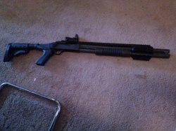 our shotgun with the new rail system and pistol grip. *the red dot sight&rsquo;s only on to see if it&rsquo;d fit