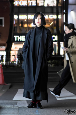 tokyo-fashion: 19-year-old Moeno on the street in Harajuku wearing a dark look including a Christophe Lemaire maxi coat and items by the Japanese designers Yohji Yamamoto, LIMI Feu, Anrealage, and Taro Horiuchi. Full Look