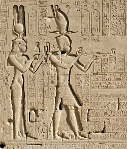 ancientart:Section from the rear wall of the temple of Hathor at Dendara. Here we can see Cleopatra VII and Ptolemy XV Caesarion (the son of Cleopatra and Julius Caesar) offering to the deities of Dendara.Caesarion (as he was nicknamed) was placed