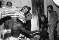 70sscifiart:  HR Giger and Ridley Scott giving an alien a smoke