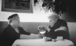 wehadfacesthen:  Kim Novak listens to a fortune teller, Los Angeles, 1956