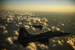 youlikeairplanestoo:  Too good not to share.  A U.S. Air Force T-38 Talon aircraft and B-2 Spirit aircraft fly in formation during a training mission over Whiteman Air Force Base, Mo., Feb. 20, 2014. The B-2 is a multi-role bomber capable of delivering