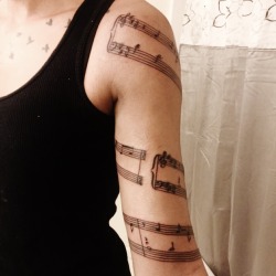 fuckyeahtattoos:  A few chords from “holocene” by Bon iver. Done by Rob Hamper at Tattoo World. Fayetteville, NC