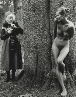 historium: Imogen and Twinka at Yosemite, photo by Judy Dater, 1974 The photo depicts elderly photographer Imogen Cunningham, encountering nude model Twinka Thiebaud behind a tree in Yosemite National Park and was inspired by Thomas Hart Benton’s painting