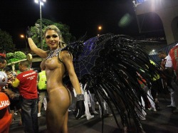 Topless woman at Brazilian carnival.