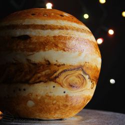archiemcphee:  A couple months ago we posted an awesome cake, created by Rhiannon at Cakecrumbs, that not only looked like the planet Earth, but also contained layers that represented the actual composition of our home planet. Rhiannon has returned with