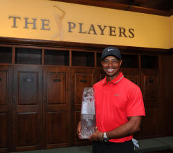 siphotos:   Tiger Woods poses with the winner’s trophy in the champions locker room  after the final round of THE PLAYERS Championship on THE PLAYERS Stadium Course at TPC Sawgrass (Stan Badz/PGA TOUR) GALLERY: Tiger Woods - The College Years  Congrats