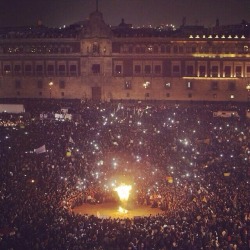 nezua:  stunningpicture:  Current march in Mexico City against the government, taken in the Zocalo. Bring awareness to our cause, please.  Mexicans do not play at Revolution. We were bred from it. 