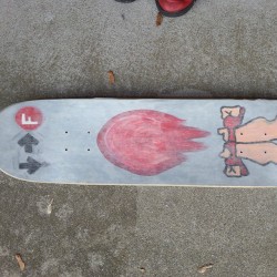 Skateboard deck top with clear grip tape.