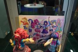 Toy Fair’s going on and Kotobukiya’s doing statues of human versions of MLP ponies. I found their designs really cute and wanted to share pictures with you. Toyark has a photoset of the two finished statues they had on display of Pinky Pie and Twilight