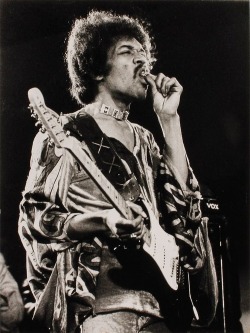 rocknrollhighskool:  Jimi Hendrix toking