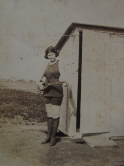 uketeecee: Girl strumming ukulele near shed. Circa 1915 