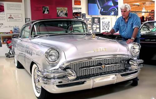 frenchcurious:Jay Leno avec une de ses premières voitures, une Buick Roadmaster Riviera de 1955. - source 40 &amp; 50 American Cars.