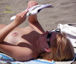 beach voyeur photo of pierced nipples