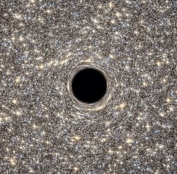 sassmafia:  nudue:  z-v-k:  M60-UCD1 black hole, via NASA  this is so fucking unreal  no. fucking. way