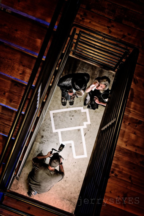 “Film Is Dead” Imaged in the stairwell of a local studio I frequent.  That is Kari Shannon as the grieving widow, Jeremy as the detective, and Lance Shuey (one of my local photographer buddies) as the police photographer. I hope you young