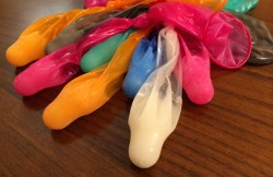 dunroman:  bestpiece:  Eight loads of frozen cum in colorful condoms  O, it would be a rainbow in my mouth! 