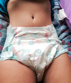 starry-eyed-princxss:  Got my first R E A L diapers yesterday!!!! Snuggies Waddlers are so freaking comfortable!🍼👼 