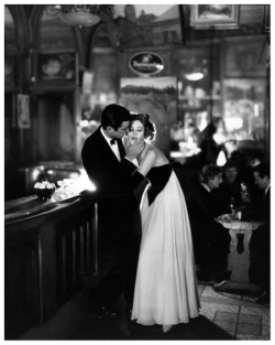 vampdreaminginhollywood:  Suzy Parker is wearing a Lanvin-Castillo evening dress of deep purple velvet and white chiffon, with actor Gardner McKay at the Cafè des Beaux-Arts, Paris. Photographed by Richrd Avedon, August 1956. 