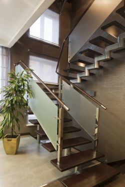 homestratosphere:  A modern staircase with frosted glass railing panels and floating wooden treads. Do you like this metal, glass, and wood design?
