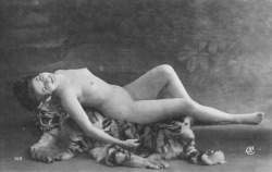 Another woman lounging atop a dead animal. Why was this a thing?