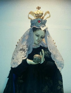 allaboutmary: Nuestra Señora de la Buena Muerte An 18th century statue of Our Lady of Good Death in Aguascalientes, Mexico. Mary is dressed in black, the colour of death and mourning, and holds a small skull in her hands. 