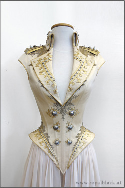 ryansarms:  Couture Corset “The Admiral” “The Admiral” is a uniform inspired corset top with high collar, lapels, spikey epaulettes and semi-transparent detachable skirt pieces.The corset is made from satin and is elaborately decorated with lace