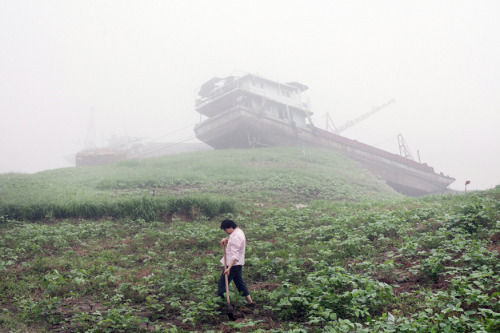 andrewharlow:  Abandoned ships grounded by flooding along the Yangtze River, Chongqing, 2012 John Francis Petersvia TIME 