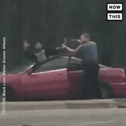 blackvoiceroyals: sugaaarrr:  lagonegirl:     POLICE OFFICER PUNCHES BLACK TEEN FOR A BROKEN TAIL LIGHT    A pair of police officers in Georgia have been fired after cell phone videos surfaced of a violent arrest they made this week.An officer, identified