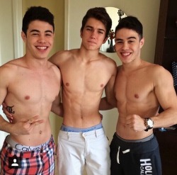 adultmaletwins:  The Rocha Twins, Gustavo and Tulio, with a friend.