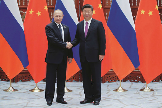 Official visit of the Russian President to China. This handshake between Vladimir Putin and Xi Jinping heralded a dynamic improvement in Russian–Chinese relations. Mikhail Metcel, TASS
