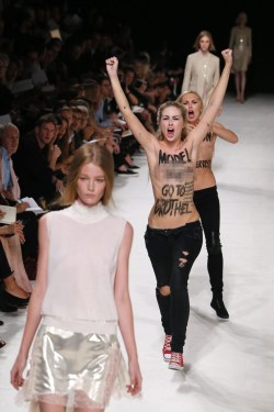 theproserpina:  e-brat:        &lsquo;I wish I’d pushed them off the stage&rsquo;: Model furious after topless protesters 'ruin&rsquo; Paris fashion show The biggest shock of Paris’s spring-summer 2014 fashion shows came on the otherwise calm and