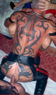 leathercockpriest:TRUE DISCIPLE AND SON OF COCK, HIS GOD TATTOOED ONTO HIS BODYHE KNEELS AND IS FUCKED  AND FILLED BY HIS LORDS AND BROTHERS IN COCK!