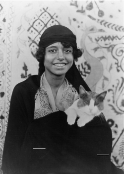 bastet-rising:    Egyptian woman and her cat, 1923.  
