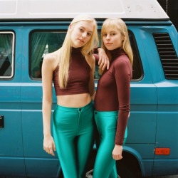 americanapparel:  Emilia and Amanda in the East Village, NYC.  Amanda is wearing the Cotton Spandex Sleeveless Turtleneck Crop Top, Disco Pant, and Pleated Loafer. Emilia is wearing the Cotton Spandex Jersey Long Sleeve Turtleneck, Disco Pant, and Unisex