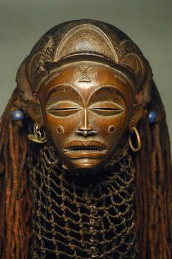 dynamicafrica:  virtual-artifacts:Mask from the Chokwe people of DR Congo, Angola or Zambia ca. early 20th century Wood, beads, raffia, cloth, metal, rope  note the septum.