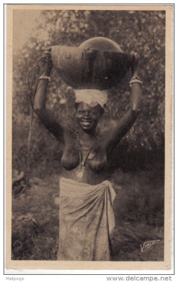   Senegalese woman, via Delcampe.  