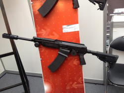 gunrunnerhell:  Vepr 12 I’m not sure what the model designation is on this particular one, it was displayed at the 2012 Moscow International ARMS &amp; Hunting Exhibition. Notice the left hand side charging handle at the front near the gas block. I