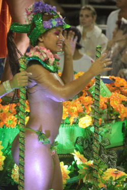 Topless at a Brazilian carnival, by Carlos Reis.
