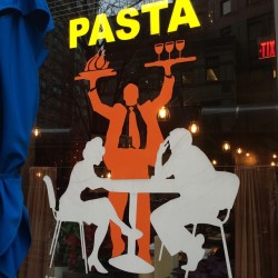 benwarheit:  Things I like about this decal on a restaurant window: -the insane orange waiter -that he’s carrying his plates in the air like a strongman -the couple looks like this isn’t the first time he’s done this, but it’s easier to just let