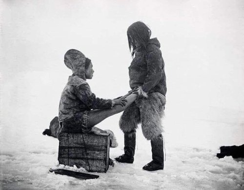 Inuit man warms his wife’s feet, Greenland, 1890&rsquo;s. Nudes &amp; Noises  