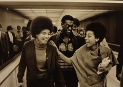 Left to right: Angela Davis, Kwame Ture (Stokely Carmichael), and Barbara Easley (Emory Douglas’s sister) at LAX, Los Angeles, California. Taken from “Black Panthers: 1968” by Howard L. Bingham