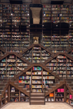 archatlas:     Zhongshuge Bookstore  Zhongshuge Bookstore in Chongqing city has an interior that’s the stuff of fantasy tales. Designed by architecture firm X+Living, the location—dubbed one of the most beautiful bookstores in China—is a mirrored